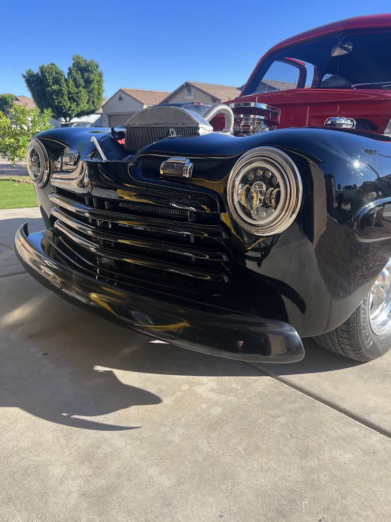 Detailed front view of a restored classic truck
