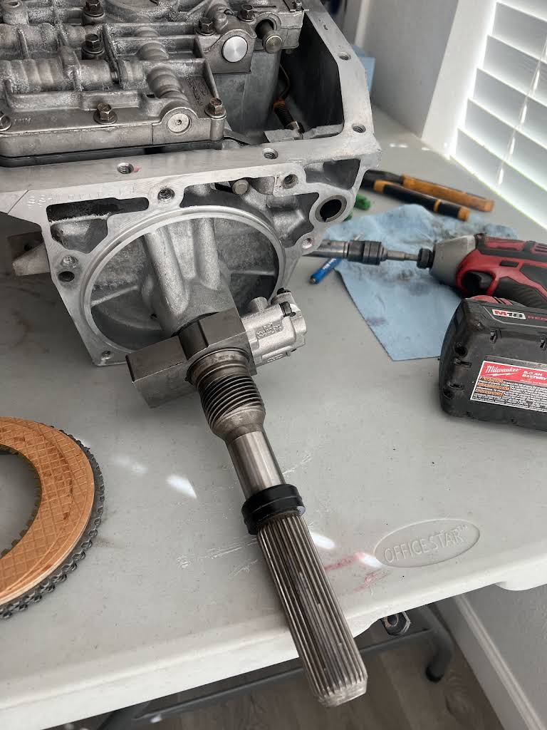 Transmission component and mechanic's tools on a work surface
